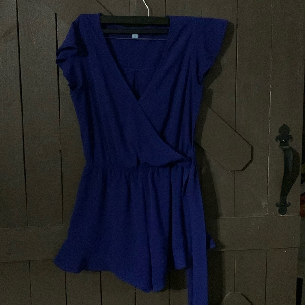 She & Sky- slightly used woman’s romper